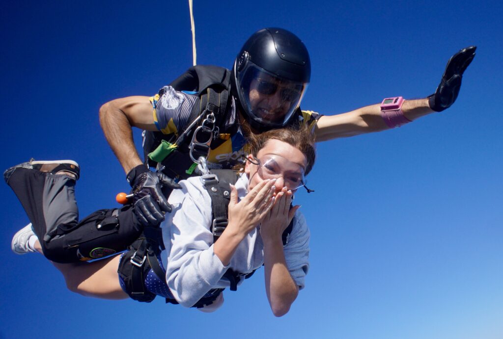 first time skydiver making faces in freefall