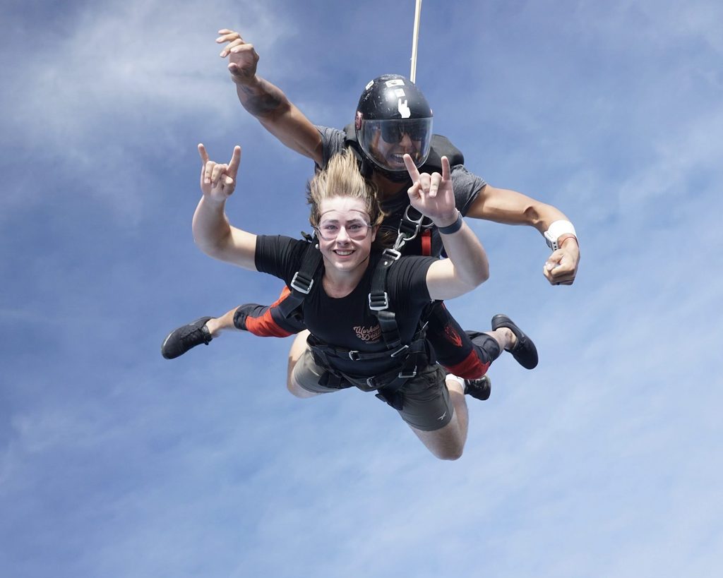Tandem skydivers top tips for your first skydive - smile for the camera in freefall!